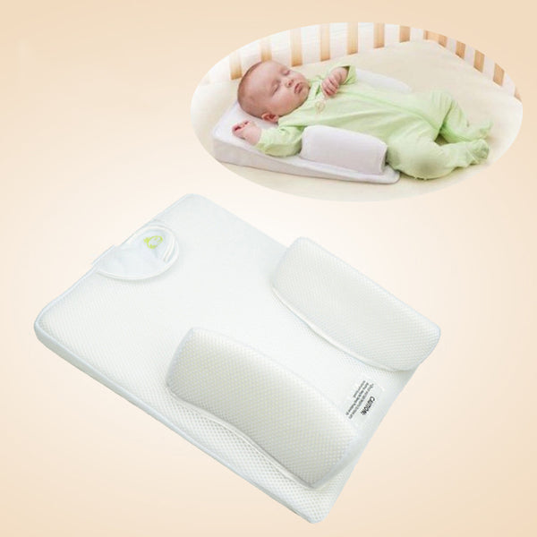 New Born Baby Infant Sleep Positioner Prevent Flat Head Shape Anti Roll Pillow